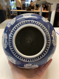 Two Chinese blue and white 'peonies' and 'peonies and antiquities' jars and covers, 19th C.