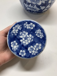 Two Chinese blue and white 'peonies' and 'peonies and antiquities' jars and covers, 19th C.