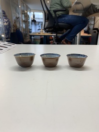 A collection of 36 pieces Chinese blue, white and famille rose cups and saucers, Yongzheng/Qianlong