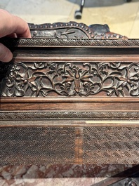 A large Chinese carved wooden table screen with a fine famille rose 'landscape' plaque, 19th C.