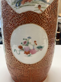 A Chinese famille rose coral-red-ground vase and a famille verte vase, 19th C.