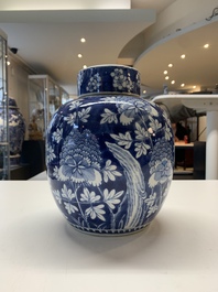 Two Chinese blue and white 'peonies' and 'peonies and antiquities' jars and covers, 19th C.