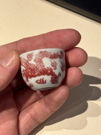 A small Chinese blue, white and copper-red 'dragon' wine cup, Lang Jin Ge Zhi 郎唫閣製 mark, 19/20th C.