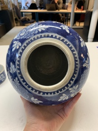 Two Chinese blue and white 'peonies' and 'peonies and antiquities' jars and covers, 19th C.