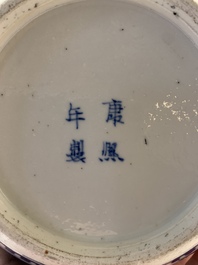 Two Chinese blue and white 'peonies' and 'peonies and antiquities' jars and covers, 19th C.