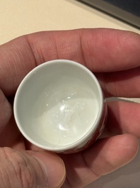A small Chinese blue, white and copper-red 'dragon' wine cup, Lang Jin Ge Zhi 郎唫閣製 mark, 19/20th C.