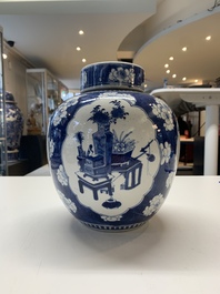 Two Chinese blue and white 'peonies' and 'peonies and antiquities' jars and covers, 19th C.