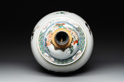 A Chinese famille verte vase and cover mounted as a lamp, 19th C.