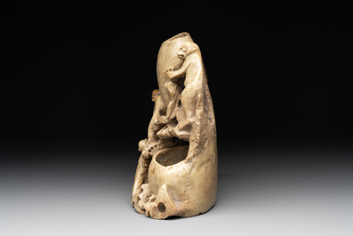 A Chinese soapstone water container with four monkeys, 20th C.