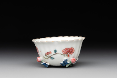 A Chinese famille rose 'rooster' teapot with applied floral design and a cup, Yongzheng/Qianlong