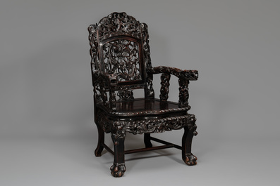 A pair of Chinese finely carved hongmu armchairs, Canton, 19th C.