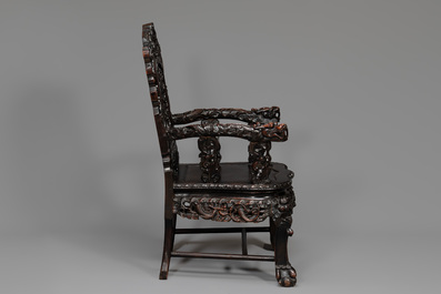 A pair of Chinese finely carved hongmu armchairs, Canton, 19th C.