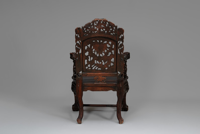 A pair of Chinese finely carved hongmu armchairs, Canton, 19th C.