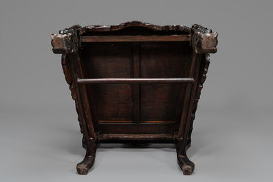 A pair of Chinese finely carved hongmu armchairs, Canton, 19th C.