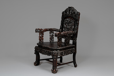 A pair of Chinese finely carved hongmu armchairs, Canton, 19th C.