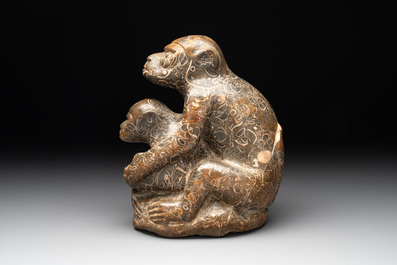 A Chinese stone group of a two monkeys, 20th C.