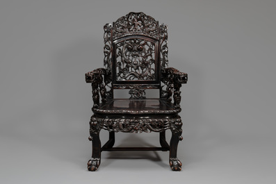 A pair of Chinese finely carved hongmu armchairs, Canton, 19th C.