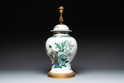 A Chinese famille verte vase and cover mounted as a lamp, 19th C.