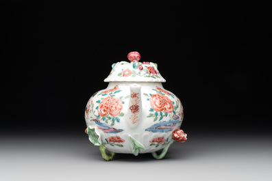A Chinese famille rose 'rooster' teapot with applied floral design and a cup, Yongzheng/Qianlong