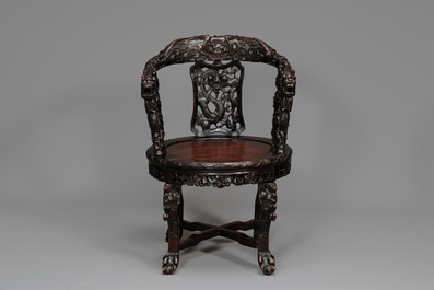 A pair of Chinese finely carved hongmu swivel chairs, Canton, 19th C.