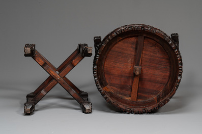 A pair of Chinese finely carved hongmu swivel chairs, Canton, 19th C.