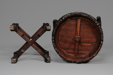 A pair of Chinese finely carved hongmu swivel chairs, Canton, 19th C.