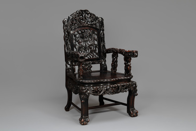 A pair of Chinese finely carved hongmu armchairs, Canton, 19th C.