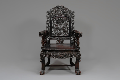 A pair of Chinese finely carved hongmu armchairs, Canton, 19th C.