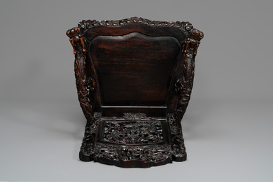 A pair of Chinese finely carved hongmu armchairs, Canton, 19th C.