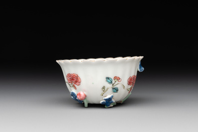 A Chinese famille rose 'rooster' teapot with applied floral design and a cup, Yongzheng/Qianlong