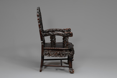 A pair of Chinese finely carved hongmu armchairs, Canton, 19th C.