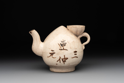 A Chinese Cizhou peach-shaped 'Lian Zhong San Yuan 連仲三元' ewer, Yuan/Ming