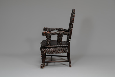 A pair of Chinese finely carved hongmu armchairs, Canton, 19th C.