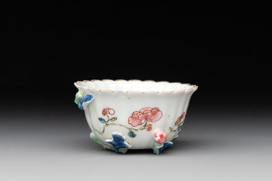 A Chinese famille rose 'rooster' teapot with applied floral design and a cup, Yongzheng/Qianlong