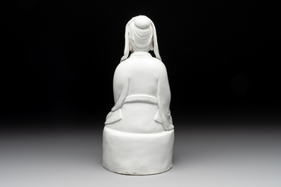A Chinese Dehua blanc de Chine figure of Wenchang, 20th C.