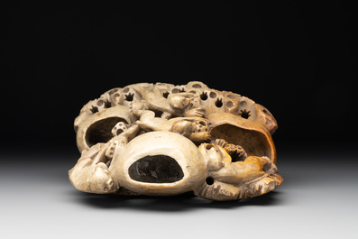 A Chinese soapstone water container with four monkeys, 20th C.