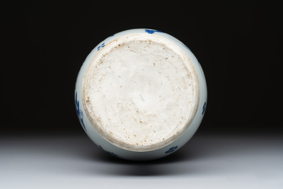 A Chinese blue and white pear-shaped vase with floral design, Transitional period