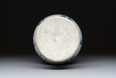 A Chinese blue and white pear-shaped vase with floral design, Transitional period