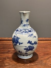 A Chinese blue and white ewer with floral design, Transitional period
