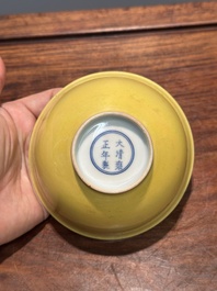A pair of Chinese yellow-glazed bowls, Yongzheng mark, 19th C.
