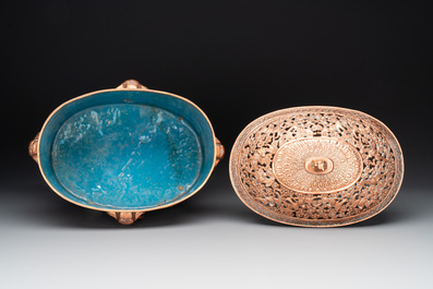A Chinese cloisonn&eacute; covered censer depicting monks and a covered censer with elephant head handles, 20th C.