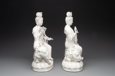 A pair of Chinese Dehua blanc de Chine Bodhisattvas seated on an elephant and a Buddhist lion, 20th C.