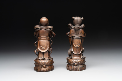 Two Chinese bronze 'He He Er Xian' figures and four immortal figures, 20th C.