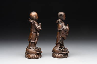 Two Chinese bronze 'He He Er Xian' figures and four immortal figures, 20th C.