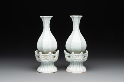 A pair of Chinese qingbai vases and a cup on a stand, 20th C.