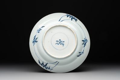 A Chinese blue and white 'Master of the Rocks' plate, Kangxi