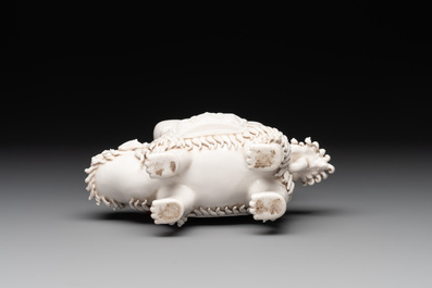 A Chinese Dehua blanc de Chine Buddha seated on a lion, 20th C.