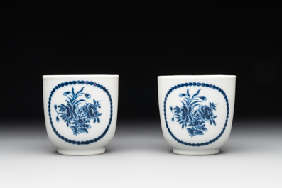 A pair of Chinese blue and white cups and saucers and a milk jug, Qianlong/Jiaqing
