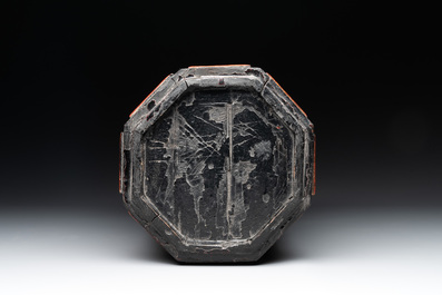 A Chinese octagonal gilt-lacquered wooden stand and four wooden carvings on stands, 19th C.