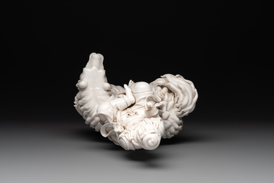 A Chinese Dehua blanc de Chine Bodhisattva seated on a Buddhist lion, 20th C.